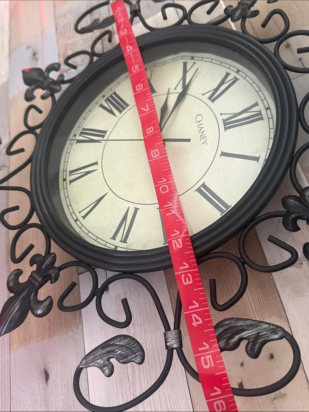 Black Ornate Metal Wall Clock - Decorative Roman Numerals